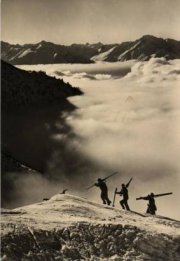 skiers in the mountains
