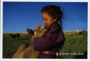 Mongolian child with goat